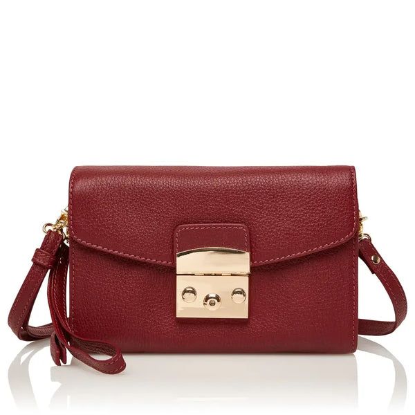 Red feminine leather shoulder bag for diabetics with gold-tone clasp and adjustable strap