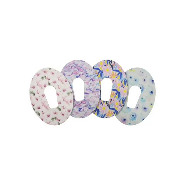 Colorful Dexcom G6 sensor patches from the Spring Collection featuring unique floral and abstract designs.