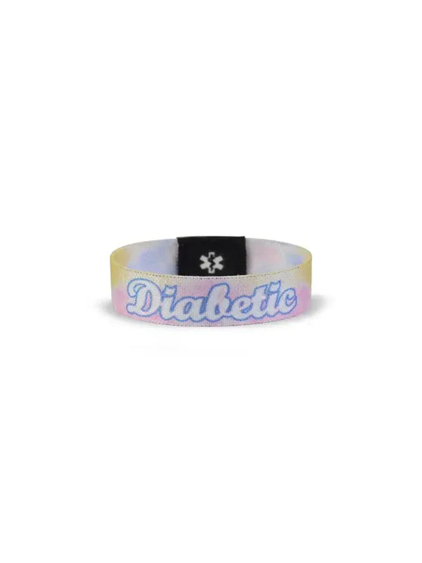 Reversible Type 1 Diabetes awareness wristband for children with "Diabetic" text, vibrant summer patterns, and daisies.