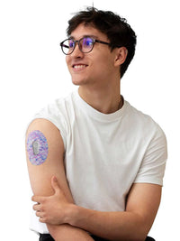 Parche adhesivo para Dexcom G6, serie Spring, llevado en el brazo por un hombre
