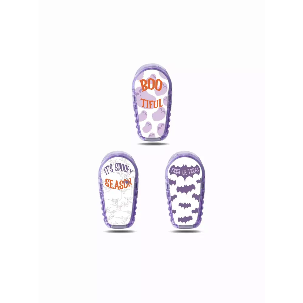Dexcom G6 Halloween Stickers - Set of 3 with designs featuring 'Boo-tiful,' 'It's Spooky Season,' and 'Trick or Treat' in purple and orange accents.