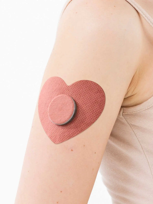 Freestyle Libre 2 heart patch worn on arm kids CGM adhesive patch ensuring secure sensor during movement