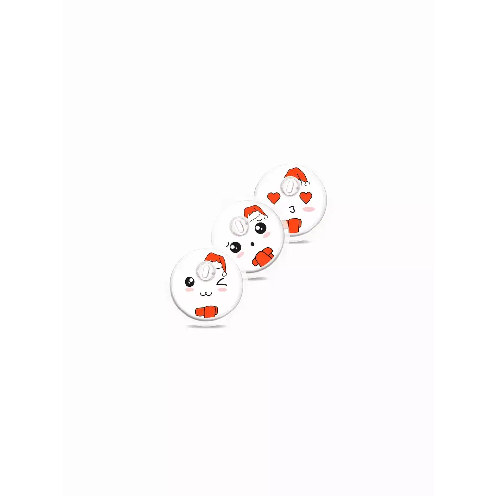 Cute cartoon cat faces in Santa hats on Freestyle Libre Christmas-themed stickers