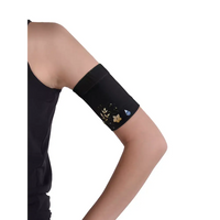 Glucose monitor and insulin pump armband in black with floral design worn on upper arm for secure diabetes device management