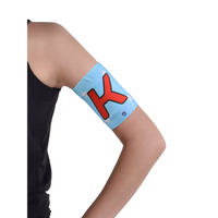 Glucose monitor and insulin pump armband in blue with red design worn on upper arm