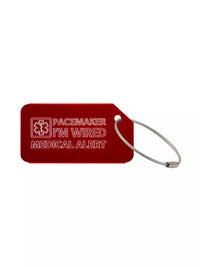 Red medical luggage tag with the text 'Pacemaker I'm Wired Medical Alert' engraved.