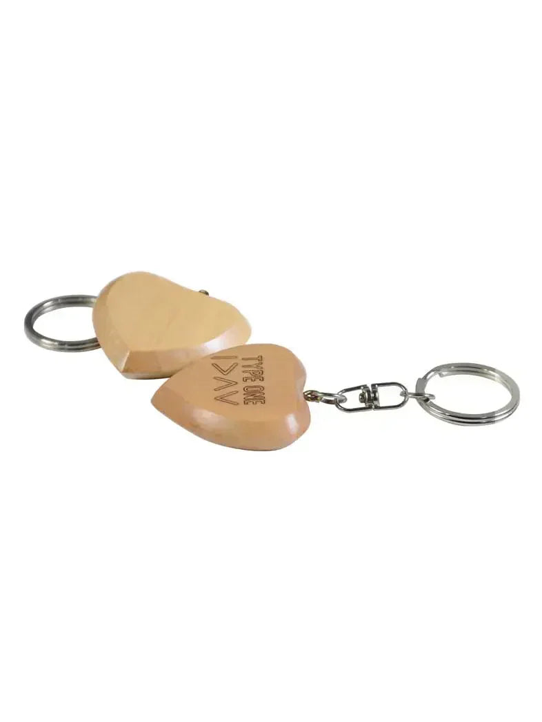 Type 1 wooden keychains for diabetics, engraved with "Type 1 Diabetic" and symbols, heart-shaped design.