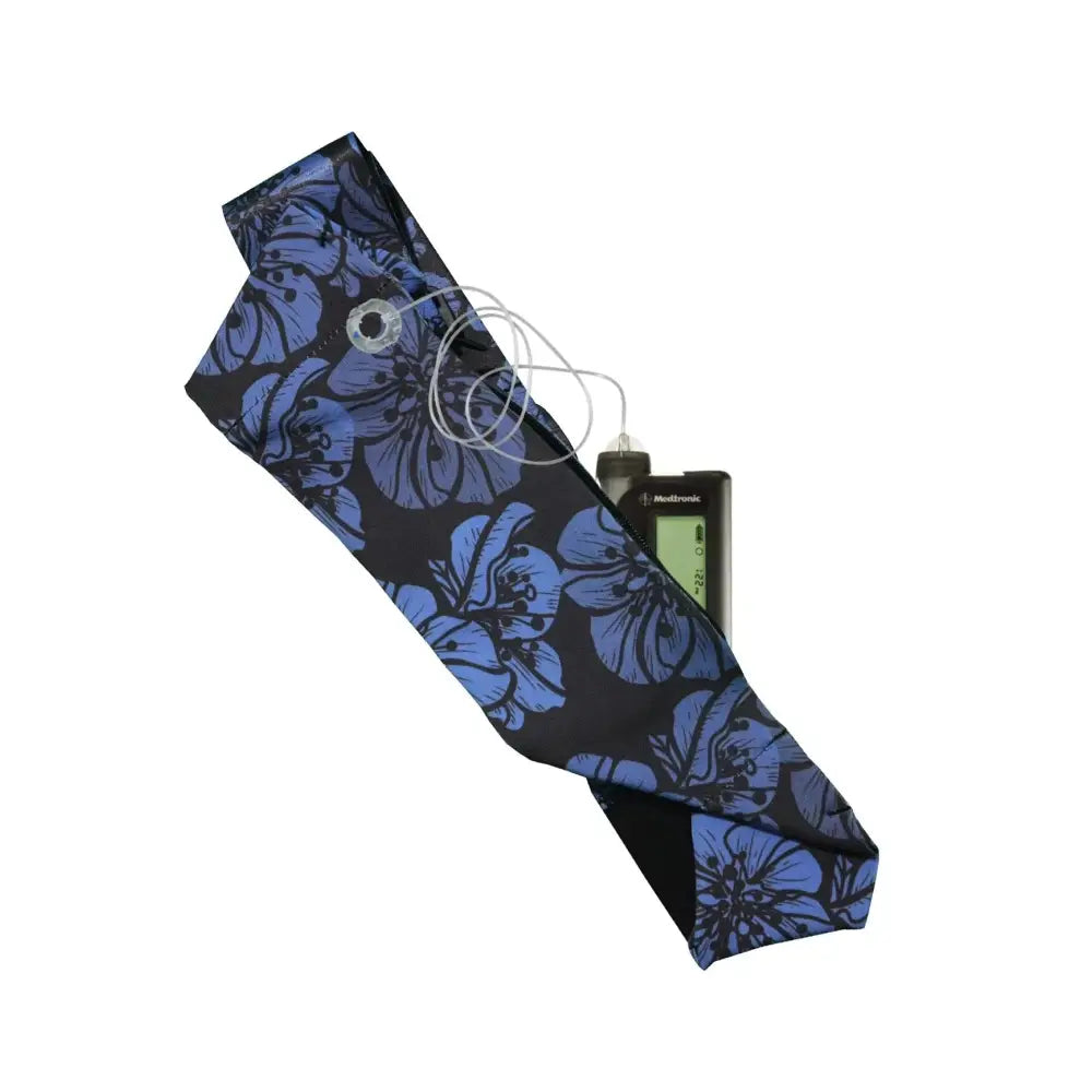 Adjustable insulin pump waist belt with floral design and reinforced openings.