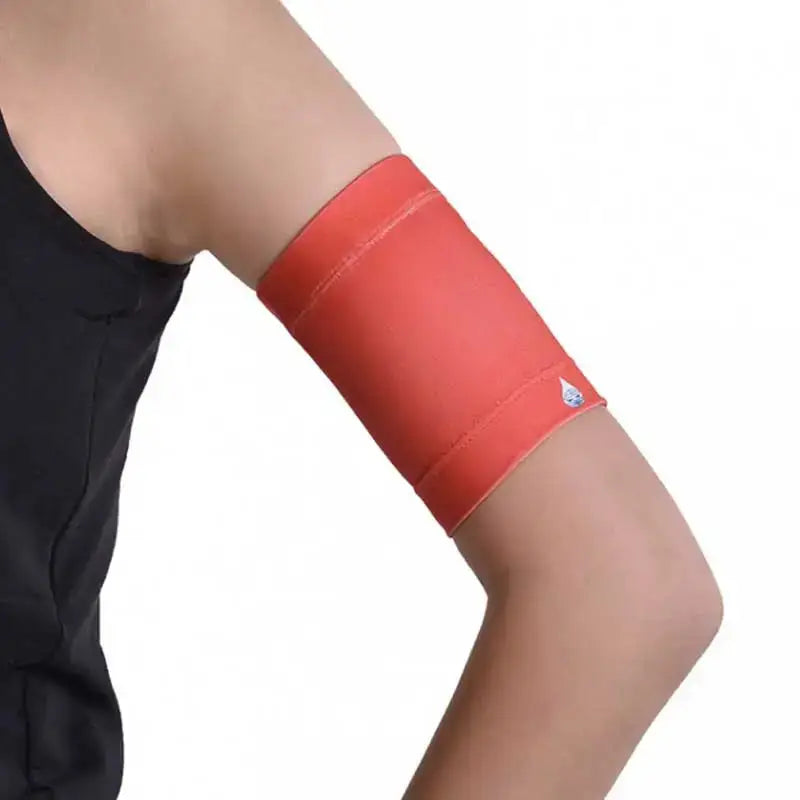 Children wearing Dia-Band armband for blood glucose sensor in red.