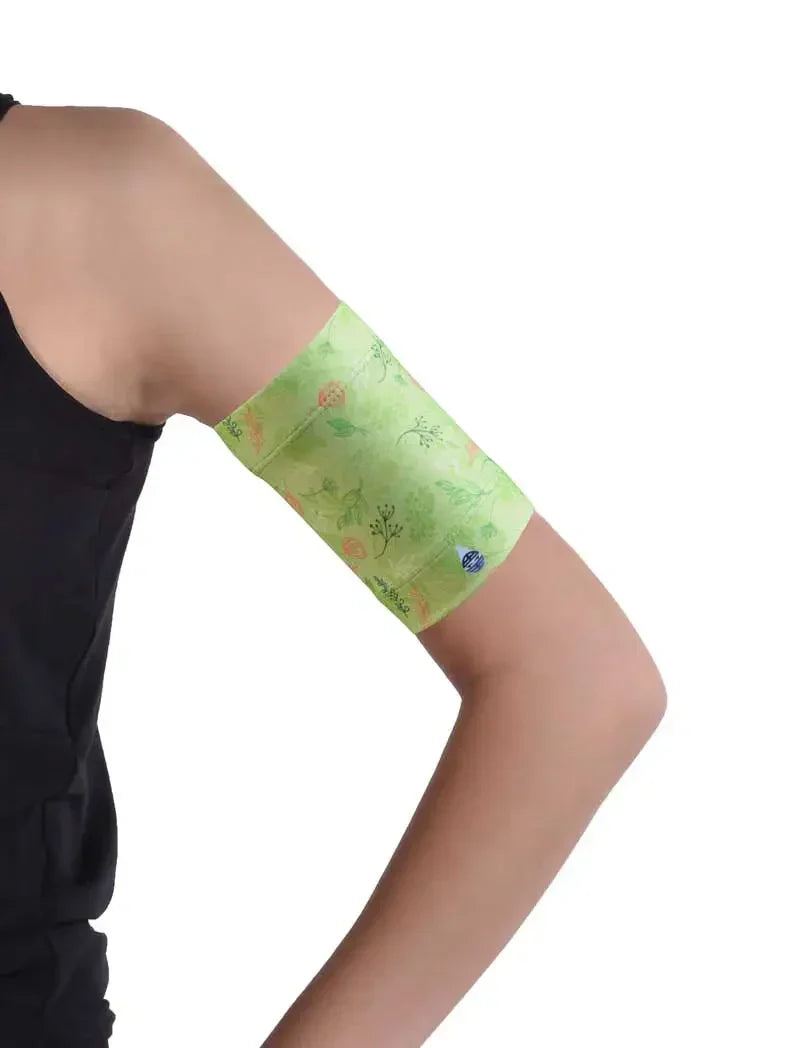 Blood glucose monitor armband for sensor protection and comfort.