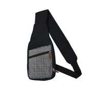 Shoulder bag with insulin cooling system for diabetes management.