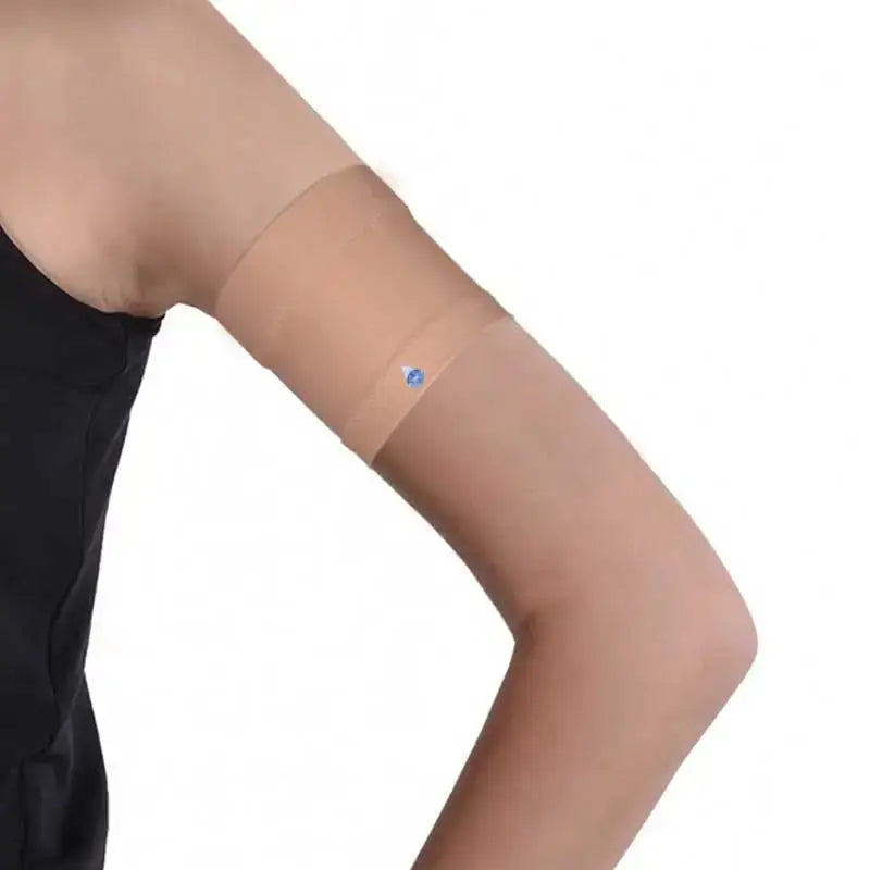 Narrow Diabetic Sensor Armband on upper arm for secure glucose sensor protection.