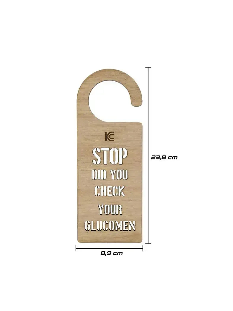 Door hanger for diabetics with "STOP! DID YOU CHECK YOUR GLUCOMEN" message in light plywood.
