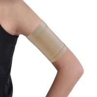 Thin and soft glucose sensor armband for kids, beige color, worn on arm.